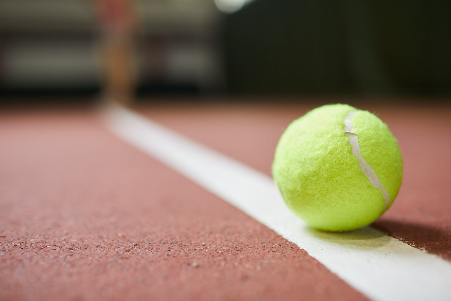 Tennis ball on a line